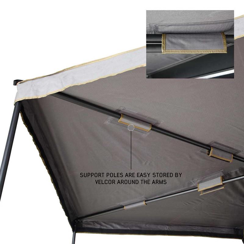 overland-vehicle-systems-nomadic-270lte-awning-support-poles-stored-by-velcro-straps-around-the-arm