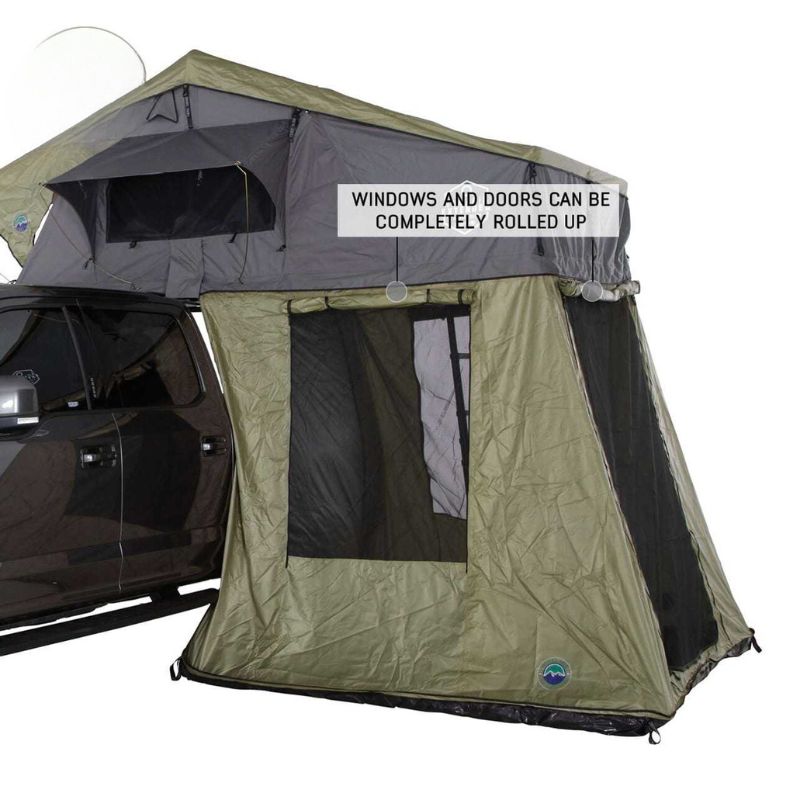 overland-vehicle-systems-nomadic-annex-fitted-to-nomadic-extended-soft-shell-roof-top-tent-gray-tent-green-annex-open-side-view-rolled-up-windows