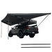 overland-vehicle-systems-nomadic-awning-180-driver-side-dark-gray-open-corner-view-on-toyota-tacoma-with-aluminum-poles-extended