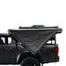 overland-vehicle-systems-nomadic-awning-180-driver-side-dark-gray-open-side-view-on-toyota-tacoma-on-white-background