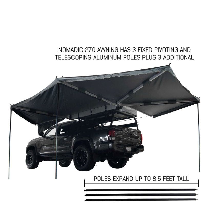 overland-vehicle-systems-nomadic-awning-270-driver-side-gray-open-rear-corner-view-on-toyota-tacoma