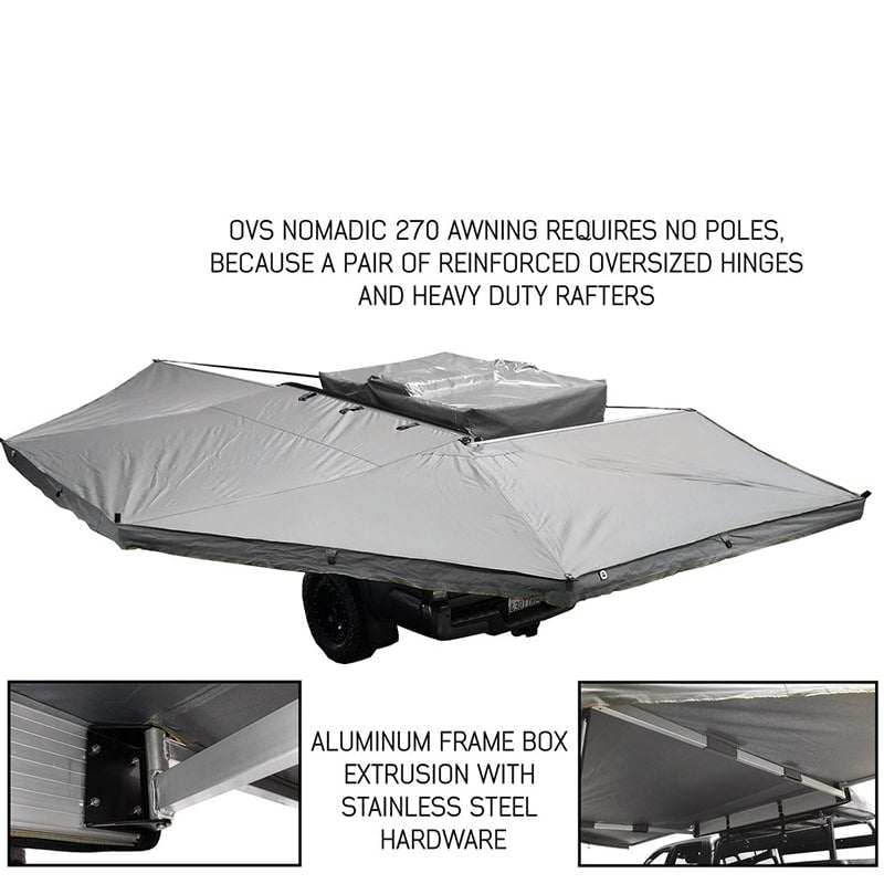 overland-vehicle-systems-nomadic-awning-270-for-mid-high-roofline-vans-driver-side-open-rear-corner-view-on-trailer-with-material-description
