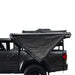 overland-vehicle-systems-nomadic-awning-270-for-mid-high-roofline-vans-driver-side-partly-open-side-view-on-toyota-tacoma-on-white-background