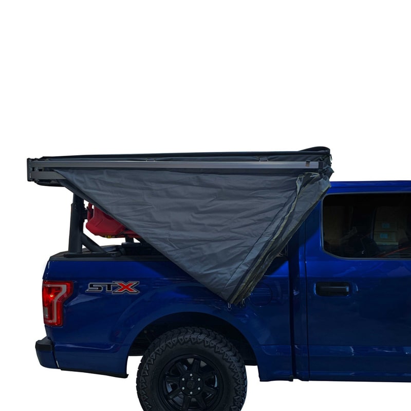 overland-vehicle-systems-nomadic-awning-270-lt-passager-side-dark-gray-open-side-view-on-ford-ranger-stx-folded-awning-and-stowed
