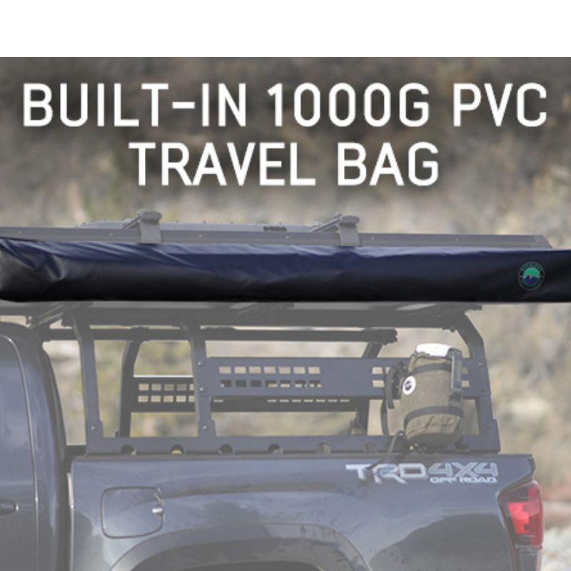 overland-vehicle-systems-nomadic-awning-4.5-ft-gray-closed-side-view-inside-pvc-travel-bag-on-vehicle-in-nature