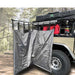 overland-vehicle-systems-nomadic-car-side-shower-room-open-folded-rear-corner-view-beside-vehicle-in-nature