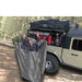 overland-vehicle-systems-nomadic-car-side-shower-room-open-top-view-beside-vehicle-with-man-inside-in-nature