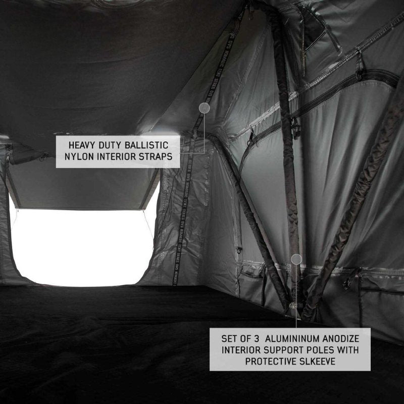 overland-vehicle-systems-nomadic-extended-soft-shell-roof-top-tent-grey-open-interior-view-with-nylon-traps-on-white-background