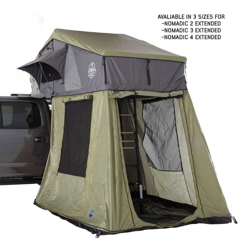 overland-vehicle-systems-nomadic-roof-top-tent-annex-green-base-black-floor-open-front-corner-view-on-white-backround