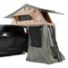 overland-vehicle-systems-tmbk-roof-top-tent-annex-green-base-black-floor-open-side-view-with-ladder-on-white-background