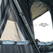 overland-vehicle-systems-xd-everest-cantilever-aluminum-roof-top-tent-gray-body-black-rainfly-open-close-up-view-heavy-duty-internal-support-poles
