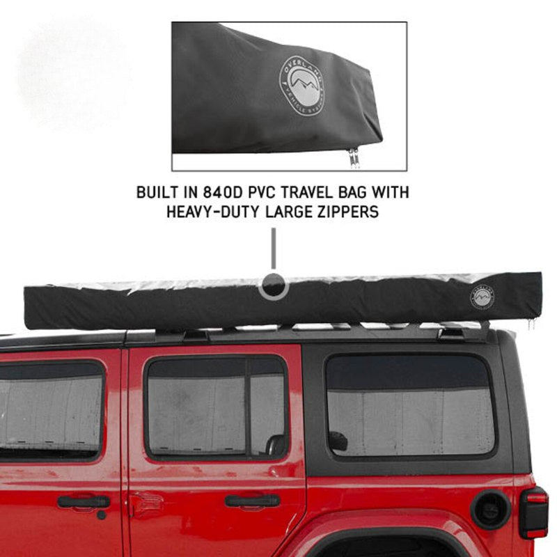 overland-vehicle-systems-xd-nomadic-180-awning-with-lights-and-black-out-closed-front-view-with-travel-bag-on-white-background