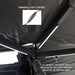 overland-vehicle-systems-xd-nomadic-270-awning-with-lights-and-black-out-grey-open-interior-view-with-led-light-and-light-control-switch-on-white-background