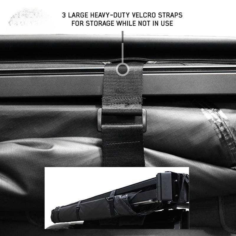 overland-vehicle-systems-xd-nomadic-270-degree-awning-and-wall-kit-combo-closed-close-up-view-with-velcro-straps-on-white-background