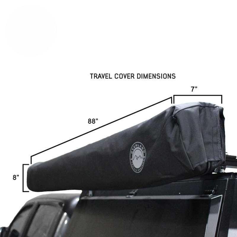 overland-vehicle-systems-xd-nomadic-270-degree-awning-and-wall-kit-combo-closed-front-corner-view-with-travel-cover-on-white-background