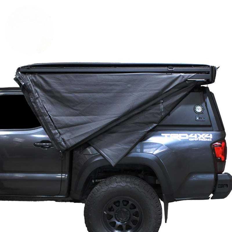 overland-vehicle-systems-xd-nomadic-270-degree-awning-and-wall-kit-combo-closed-front-view-with-screen-windows-on-white-background