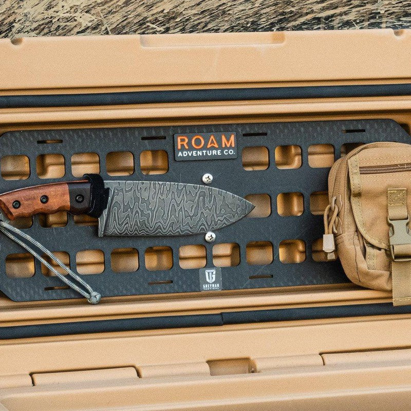 roam-105l-rugged-case-molle-panel-close-up-view-with-knife-on-rugged-case