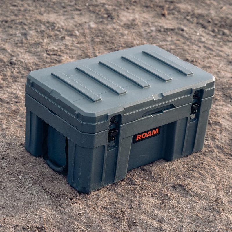 roam-76l-rugged-case-slate-top-view-in-terrain