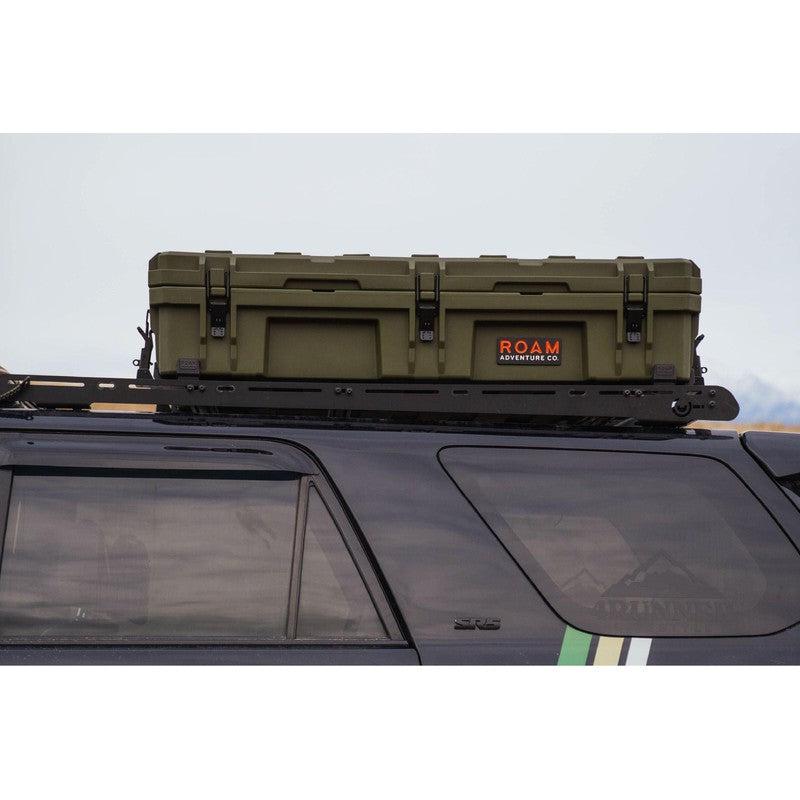 roam-95l-rugged-mounts-side-view-under-rugged-case-on-vehicle-in-nature