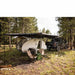 roam-arc-180-awning-open-rear-corner-view-on-trailer-in-nature