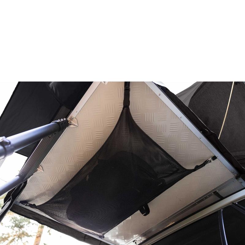 roam-vagabond-lite-rooftop-tent-black-bottom-view-on-car-with-hammock-in-forest