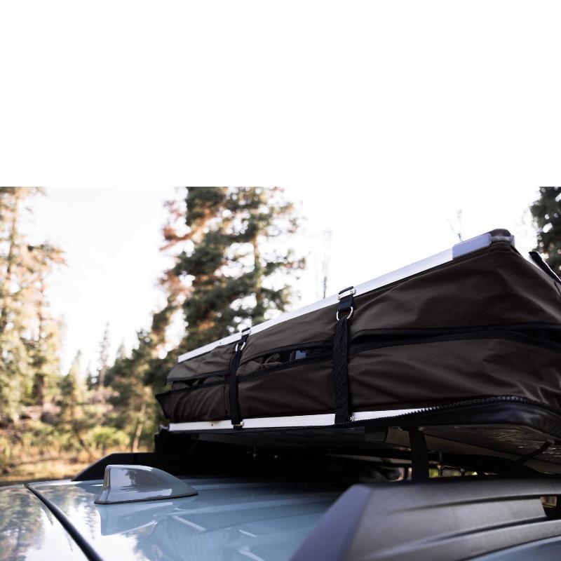 roam-vagabond-lite-rooftop-tent-black-closed-close-up-view-on-vehicle-in-nature