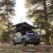 roam-vagabond-lite-rooftop-tent-black-open-front-corner-view-on-toyota-rav4-with-bike-in-nature