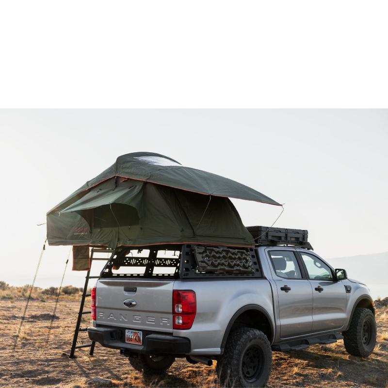 roam-vagabond-rooftop-tent-forest-green-hyper-orange-open-rear-corner-view-on-ford-ranger-in-nature