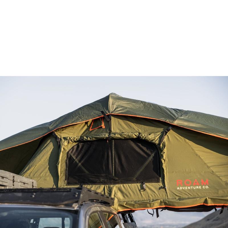 roam-vagabond-rooftop-tent-forest-green-hyper-orange-open-side-view-on-vehicle-with-window-in-nature