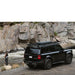 sherpa-atlas-roof-rack-for-2024-toyota-land-cruiser-lexus-gx550-roof-rear-corner-view-with-person-in-nature