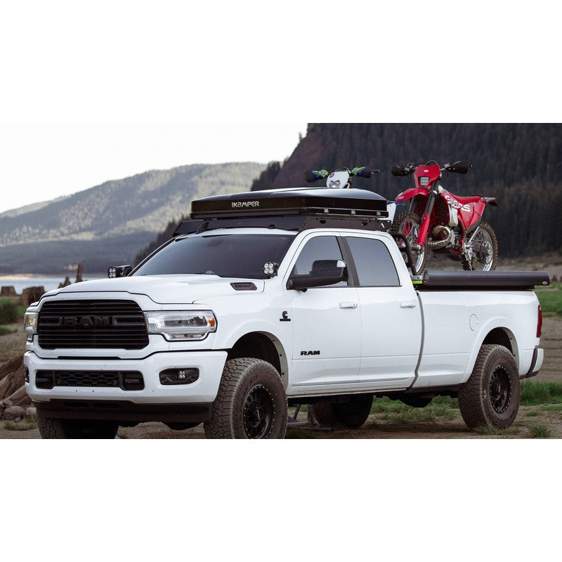 sherpa-diablo-roof-rack-for-2019-2023-ram-2500-3500-4500-5500-crew-cab-front-corner-view-with-rooftop-tent-in-terrain