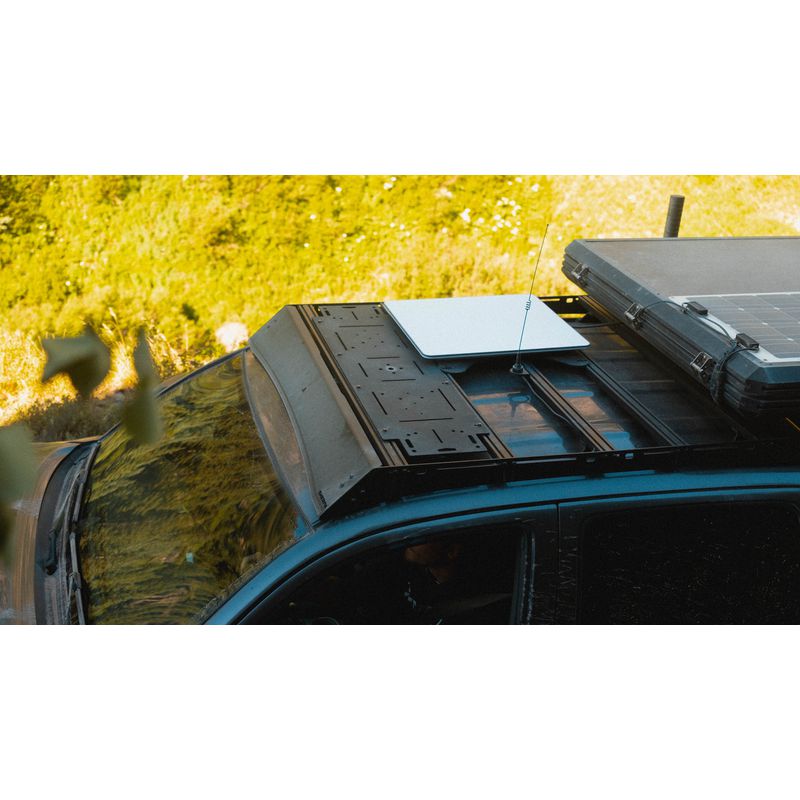 sherpa-grand-teton-sport-roof-rack-for-2005-2023-tacoma-double-cab-front-corner-view-with-accessory-panel-in-nature