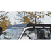 sherpa-la-sal-roof-rack-for-1990-1997-land-cruiser-80-series-front-corner-view-with-fairing-in-nature