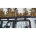 sherpa-la-sal-roof-rack-for-1990-1997-land-cruiser-80-series-side-view-with-mounting-brackets-in-foresst