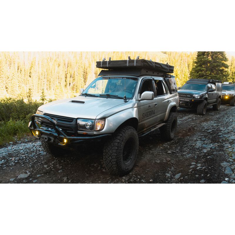 sherpa-matterhorn-roof-rack-for-1996-2002-4runner-front-corner-view-with-closed-rooftop-tent-in-nature