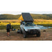 sherpa-matterhorn-roof-rack-for-1996-2002-4runner-front-view-with-person-and-rooftop-tent-in-nature