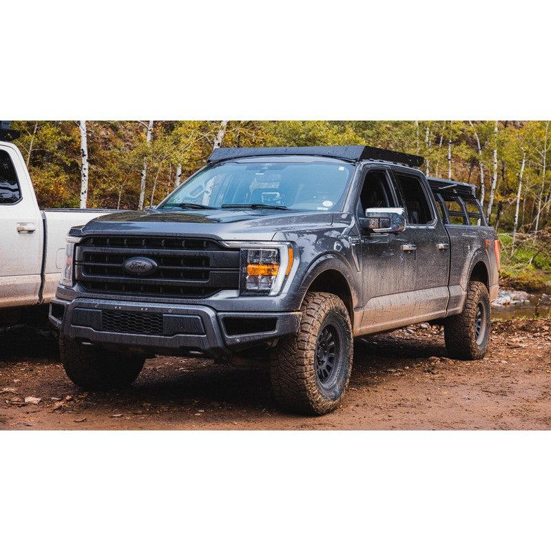 sherpa-storm-roof-rack-for-2021-2023-ford-f150-raptor-front-corner-view-in-forest