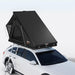 tentbox-cargo-2-hard-shell-roof-top-tent-midnight-gray-open-rear-corner-view-on-vehicle-on-white-background