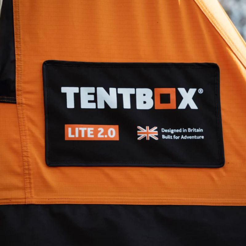 tentbox-lite-2-0-soft-shell-roof-top-tent-sunset-orange-open-side-view-with-tentbox-logo