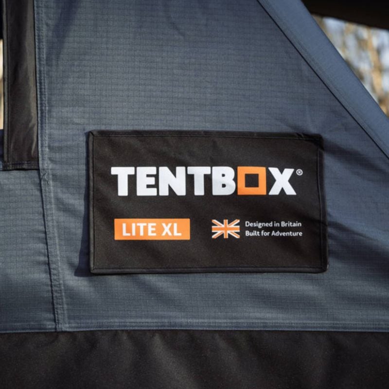 tentbox-lite-XL-soft-shell-roof-top-tent-slate-gray-open-side-view-with-tentbox-logo
