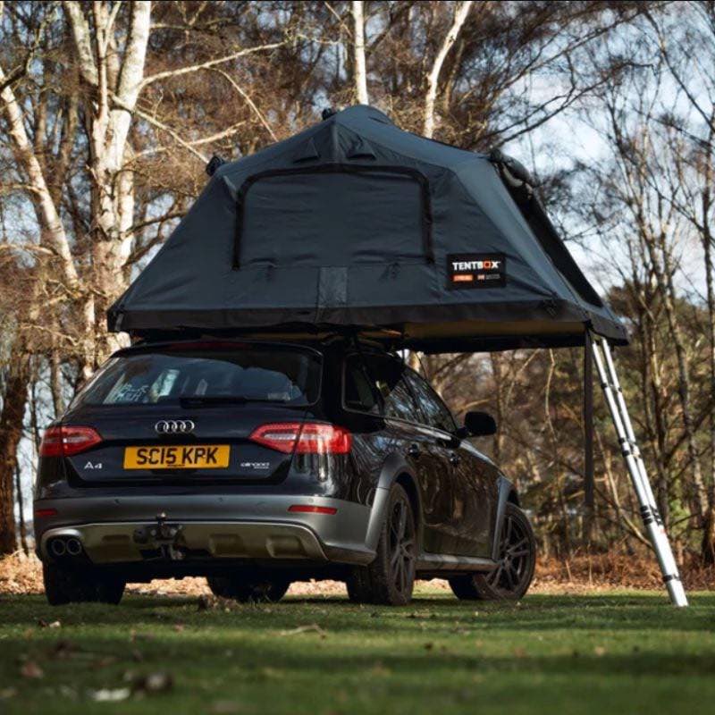 tentbox-lite-XL-soft-shell-roof-top-tent-slate-gray-open-summer-mode-side-view-on-audi-a4-in-forest