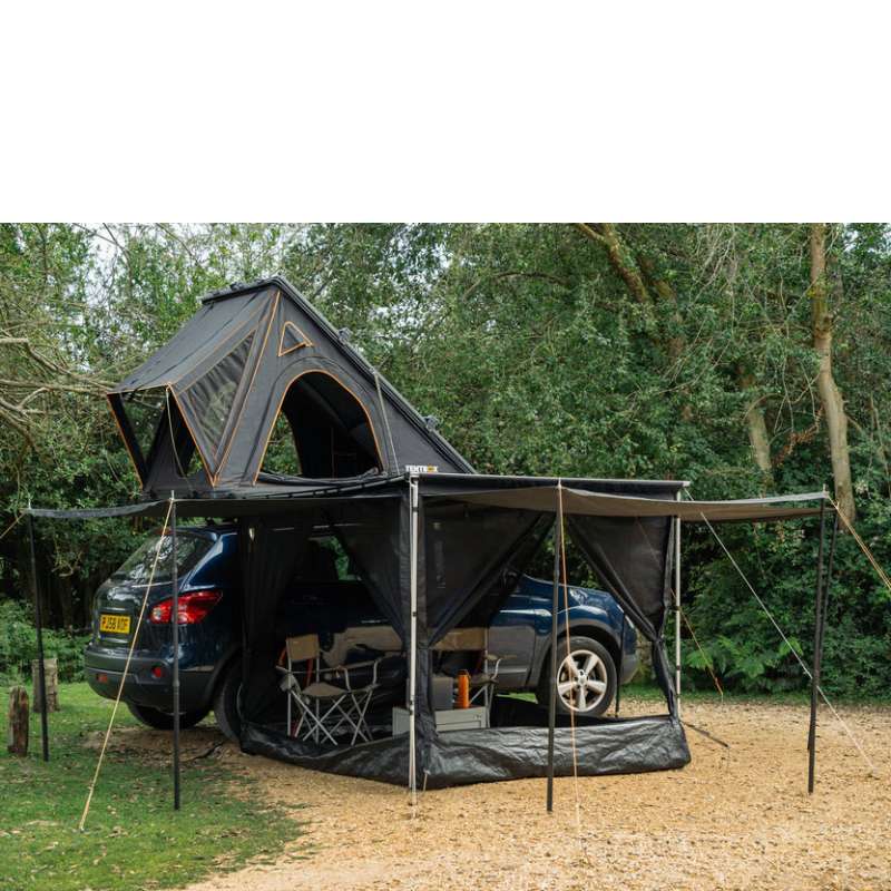 tentbox-side-awning-room-wing-mode-open-front-corner-view-on-nissan-qashqai-with-tentbox-cargo-tent-in-nature