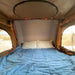 tuff-stuff-alpha-hard-shell-roof-top-tent-2-person-open-with-bedding-inside-view