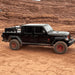 tuwa-pro-shiprock-mid-height-rack-for-t-slot-rails-side-view-on-jeep-in-nature