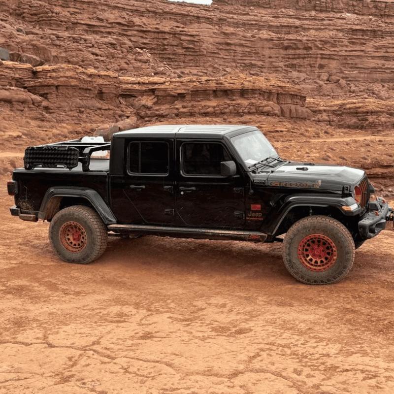 tuwa-pro-shiprock-mid-height-rack-for-t-slot-rails-side-view-on-jeep-in-nature