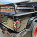 tuwa-pro-shiprock-mid-height-rack-for-t-slot-rails-side-view-on-jeep-in-parking-area