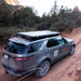 badass-tents-rugged-clamshell-roof-top-tent-closed-rear-corner-top-view-on-land-rover-discovery-5