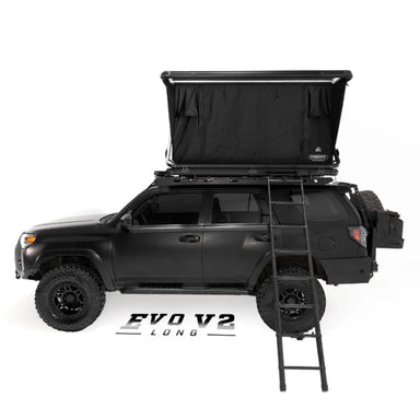 freespirit-recreation-evolution-v2-long-hard-shell-roof-top-tent-black-open-side-view-on-toyota-4runner-on-white-background